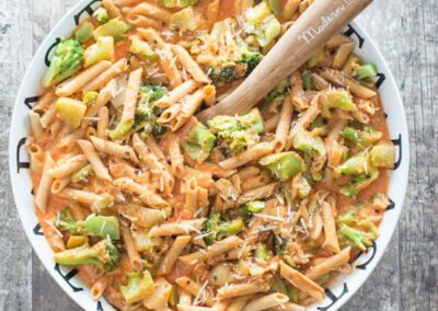Gluten-Free Vegan Red Lentil Penne with Roasted Garlic And Broccoli In A Creamy Red Pepper Sauce